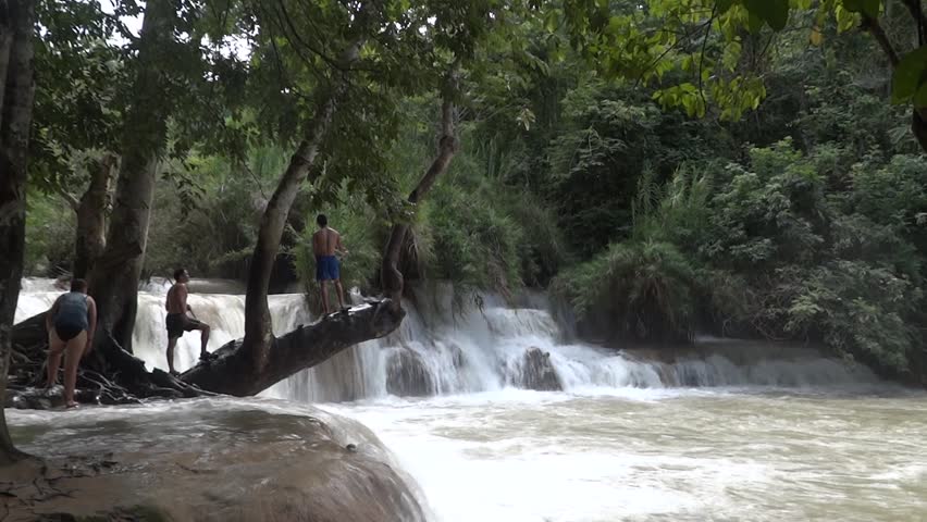TAT KUANG SI - AUGUST 17: Top of Tat Kuang Si waterfalls near ancient capital of Laos Luang Prabang August 17, 2012 in Tat Kuang Si, Laos.