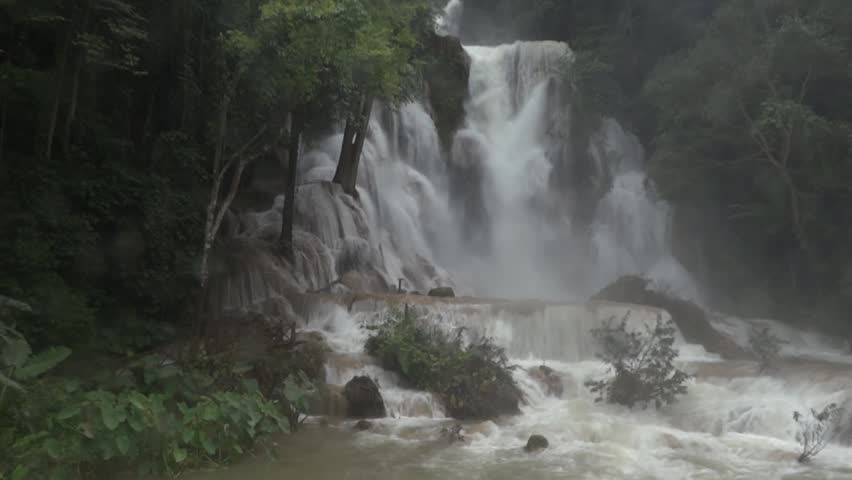 TAT KUANG SI - AUGUST 17: Top of Tat Kuang Si waterfalls near ancient capital of Laos Luang Prabang August 17, 2012 in Tat Kuang Si, Laos.