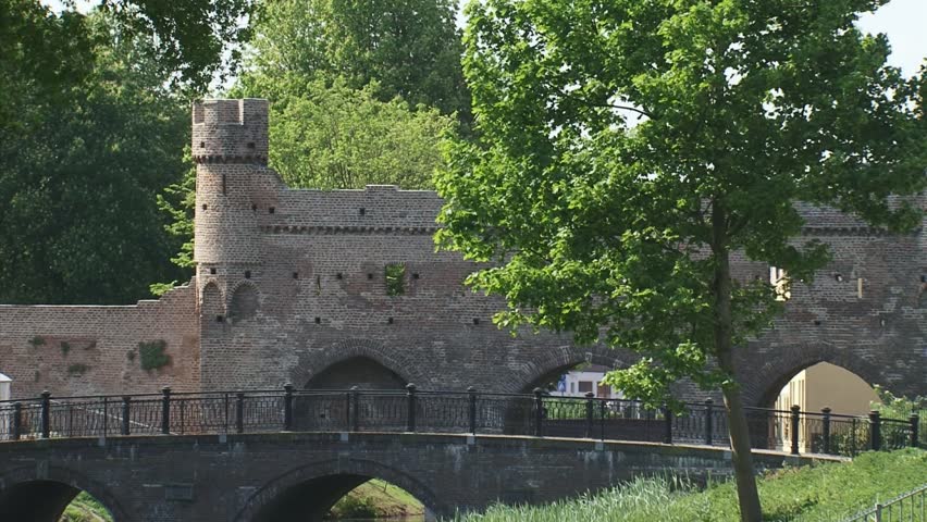 ZUTPHEN, THE NETHERLANDS - APRIL 2011: city wall with 14th century Berkelpoort
