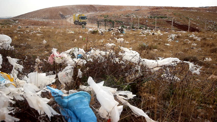 Nylon on landfill and the truck

Description: Garbage truck on landfill

