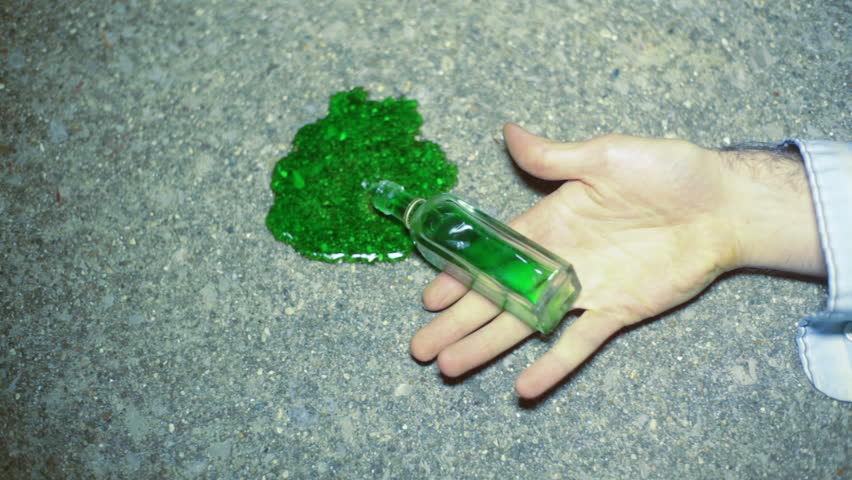 potion or posion in the hand of someone 