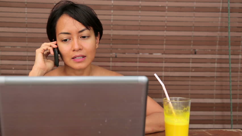 Freelance business woman working at cafe with computer