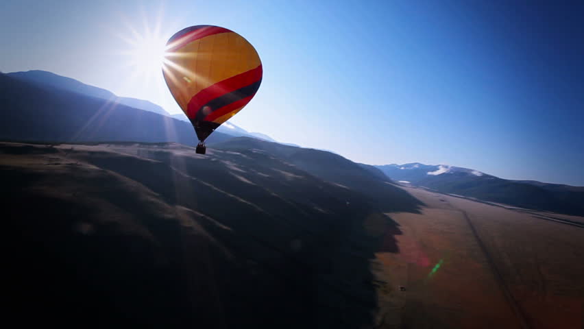 hot air balloon in mountain landscape