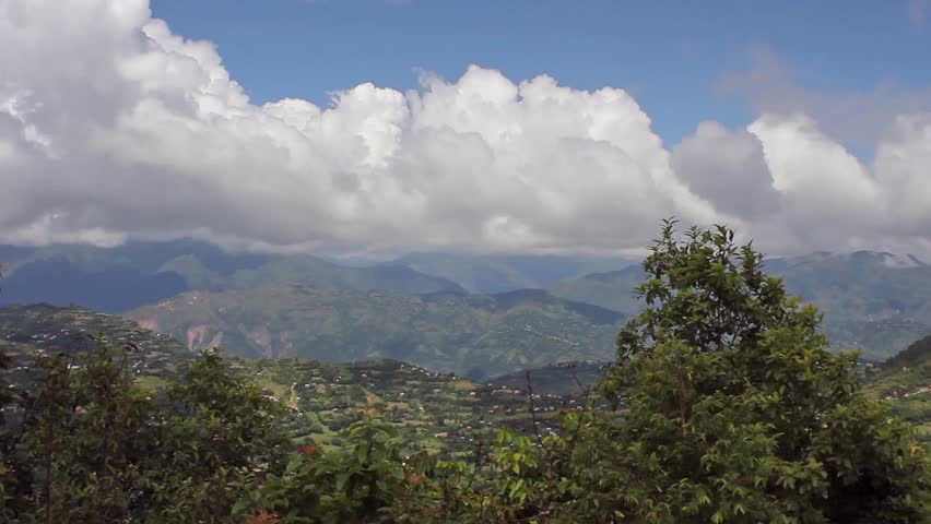 HD video of a clouds over a mountain scape