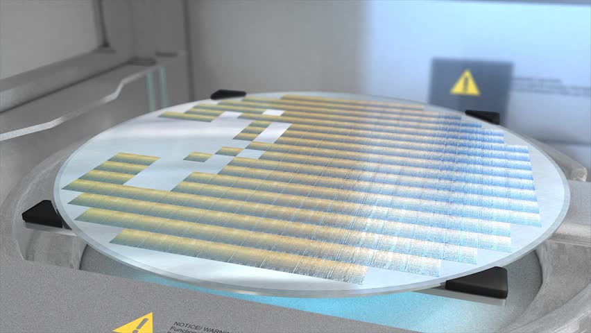 Separating a silicon wafer into individual die.