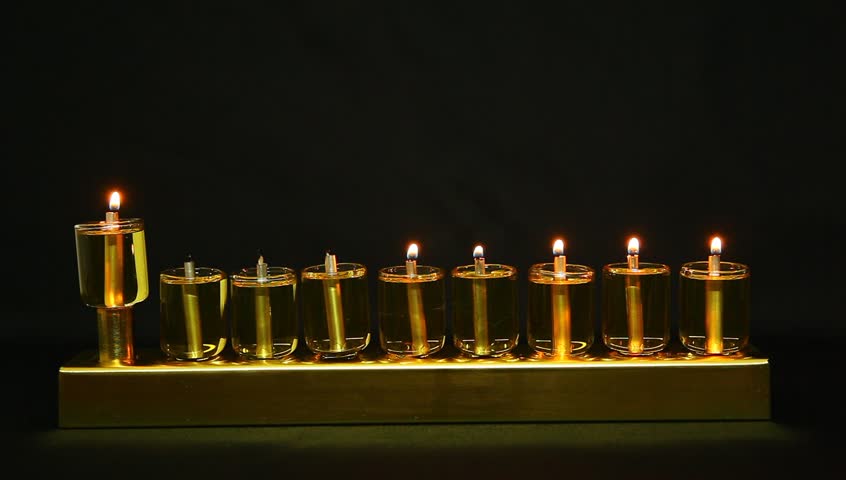 5 flames in Hanukia made of olive oil lanterns