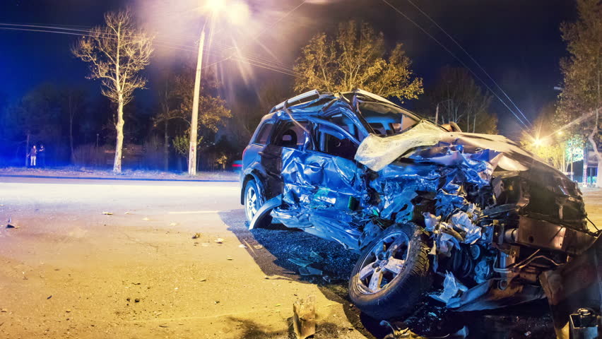 Road accident. Crashed car on the road timelapse with zoom