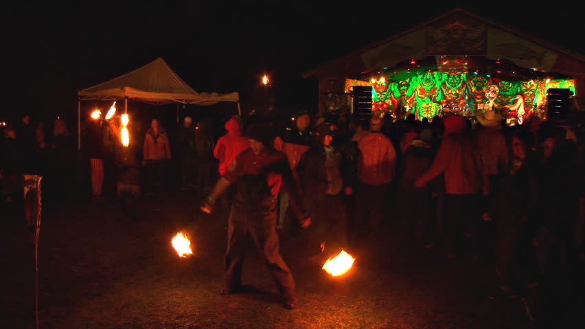 Ninilchik, AK - CIRCA 2011: Firedancers at Open-Air Concert