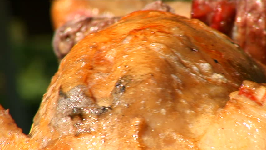 Traditional Serbian roasting of a lamb