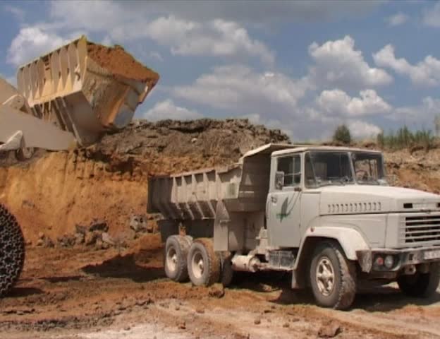 excavator load the ground