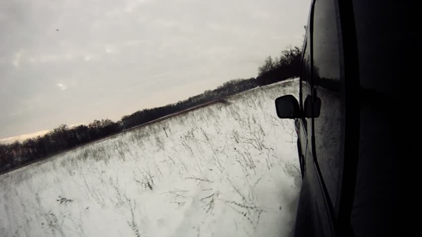 Driving through snowy lowland