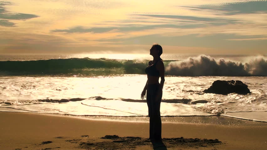 Yoga on the beach at sunset - V2 Chair Pose HD 1080i