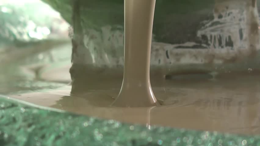 Chocolate fountain of white chocolate