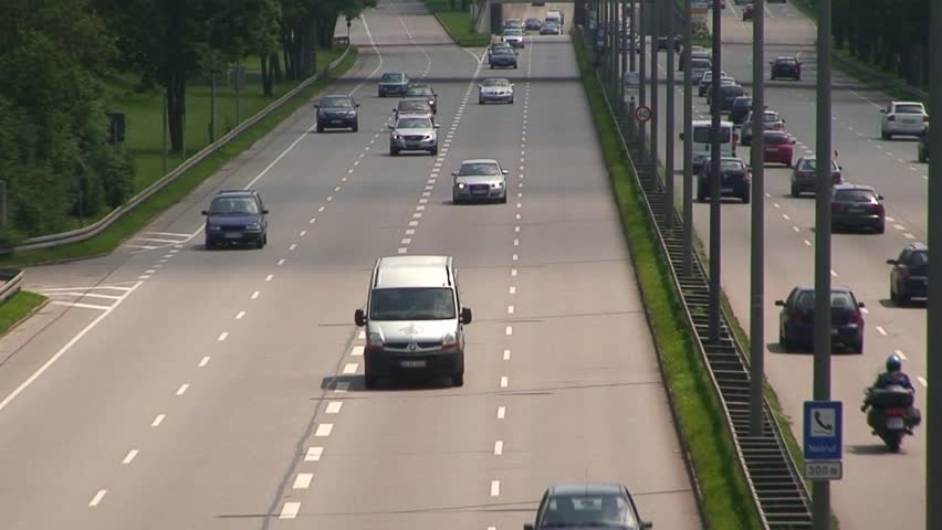 MUNICH, GERMANY - CIRCA 2011: Cars and vans traveling in the German Autobahn.