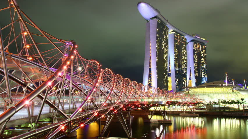 SINGAPORE - AUG 13: Time lapse of the Marina Bay Sands Resort Hotel on Aug 13, 2012 in Singapore. It is an integrated resort and the world's most expensive standalone casino.