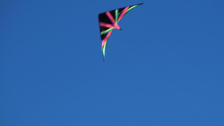 Stunt kite flying against blue sky - HD 