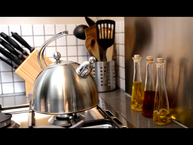 Tea kettle with boiling water