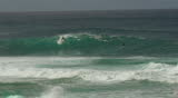 Surfer Conquers Breaking Wave, 240 fps slow motion