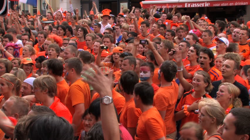 GRONINGEN, HOLLAND - JULY 11: Dutch soccer fans supporting their team during the final of the FIFA World Cup 2010 Netherlands vs. Spain - July 11, 2010 in Groningen, the Netherlands.