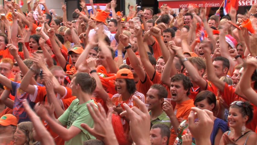 GRONINGEN, HOLLAND - JULY 11: Dutch soccer fans supporting their team during the final of the FIFA World Cup 2010 Netherlands vs. Spain - July 11, 2010 in Groningen, the Netherlands.