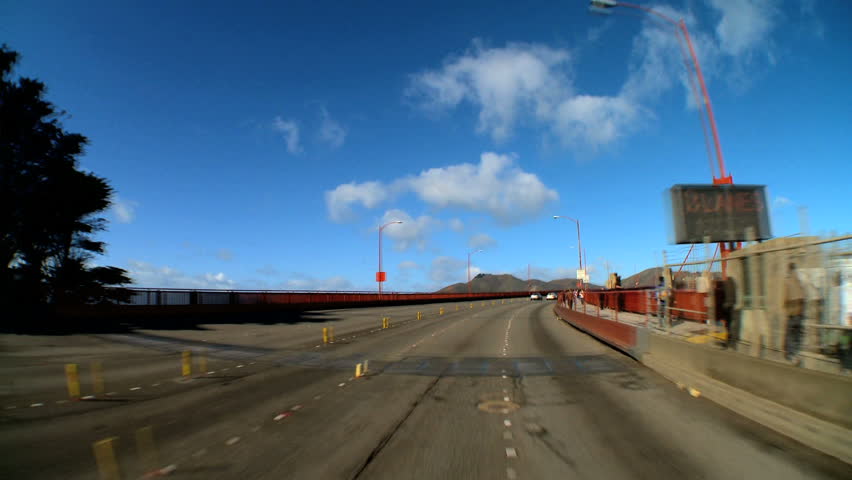 Time-lapse "point-of-view" with fish-eye of driving the Golden Gate Bridge