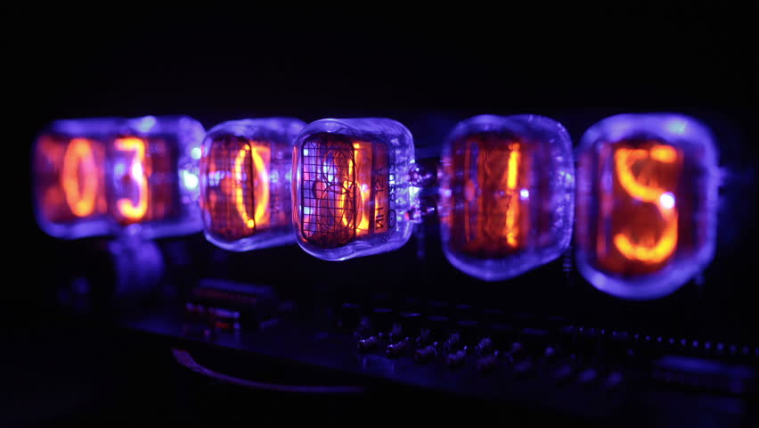 a numerical counter and number sequence filmed with an old nixie tube clock
