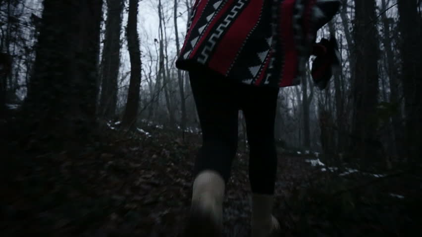 Girl trying to escape of someone who chases her in the forest