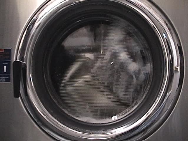 a coin operated laundry mat washes dirty clothes