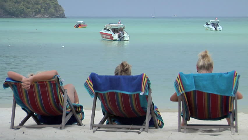 3 Scandinavian Girls enjoy the sun in Beach Chairs on Ao Ton Sai Beach