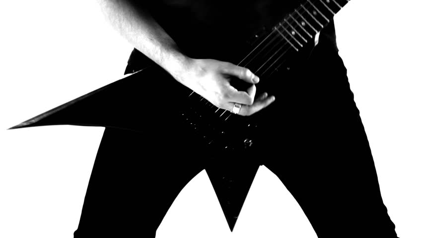 Musician playing guitar of an extraordinary shape. Black and white video.
Extraordinary guitar.
