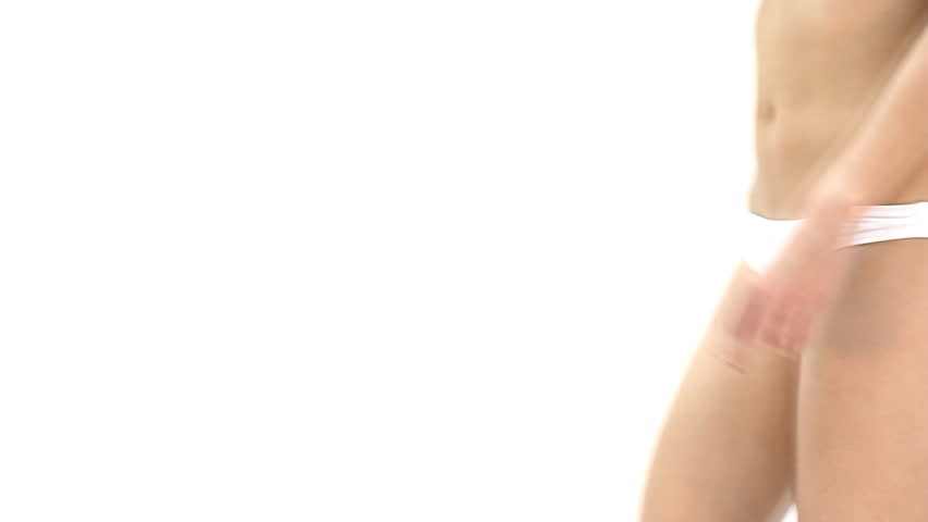 woman analyzing cellulite on her belly