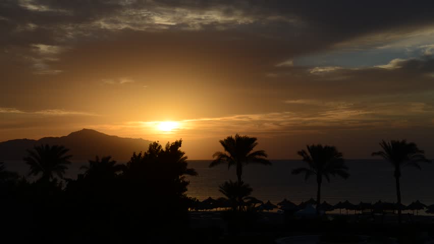Timelaps of sunrice and beach with a view on Tiran island at the luxury hotel, Sharm el Sheikh, Egypt
