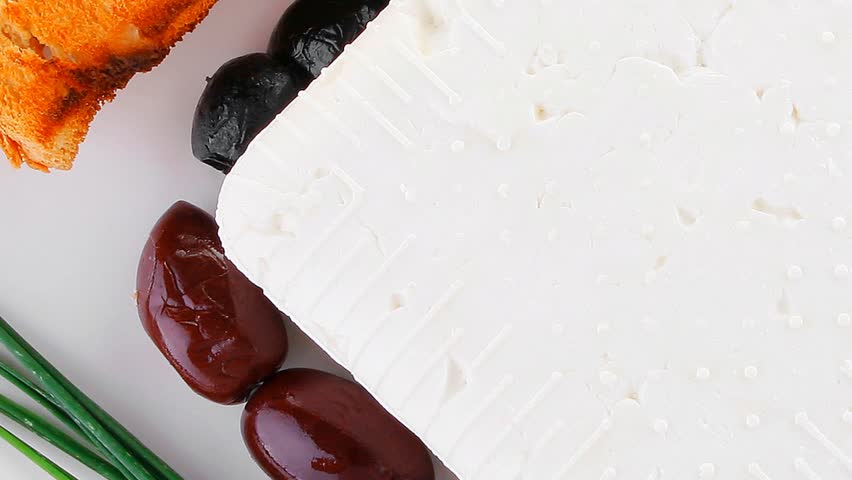 feta and olives with toast and tomatoes hidef slow motion intro