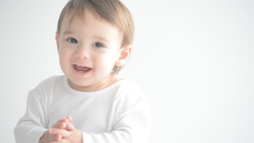 Adorable baby having fun and playing