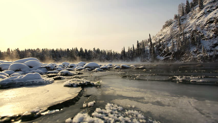 winter scenic of the River in the Altai Mountains of Siberia