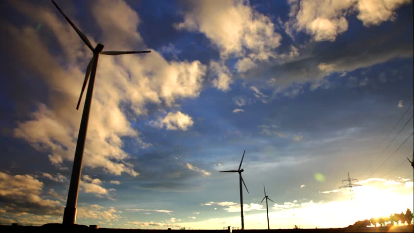 Wind power generators are against the setting sun