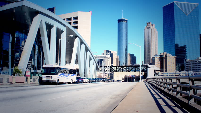 ATLANTA, GEORGIA - FEBRUARY 3: Time lapse of traffic in front of the Phillip's Arena on February 3, 2013. Phillip's Arena is a basketball court where the Atlanta Hawks play.  