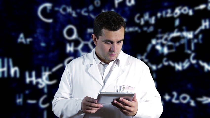 Scientist using Tablet PC with Scientific Chemistry Background