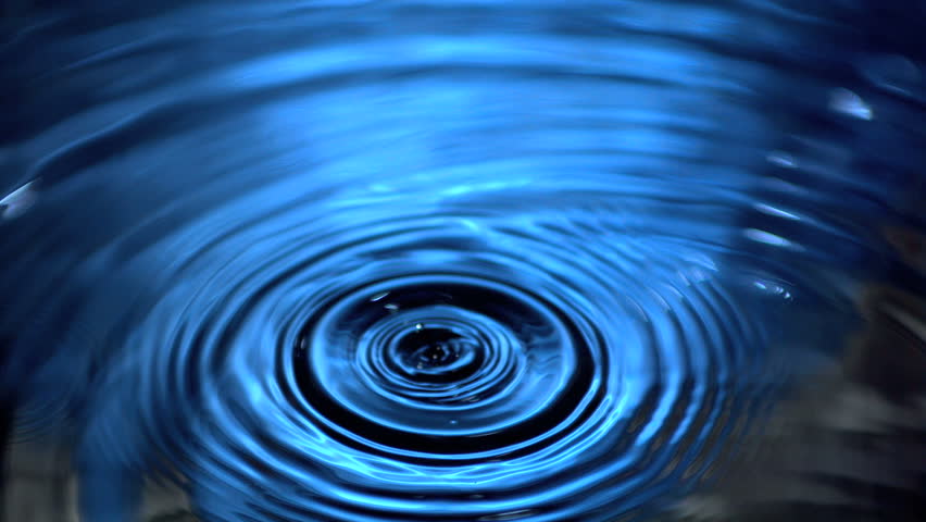 Droplets falling in water in slow motion