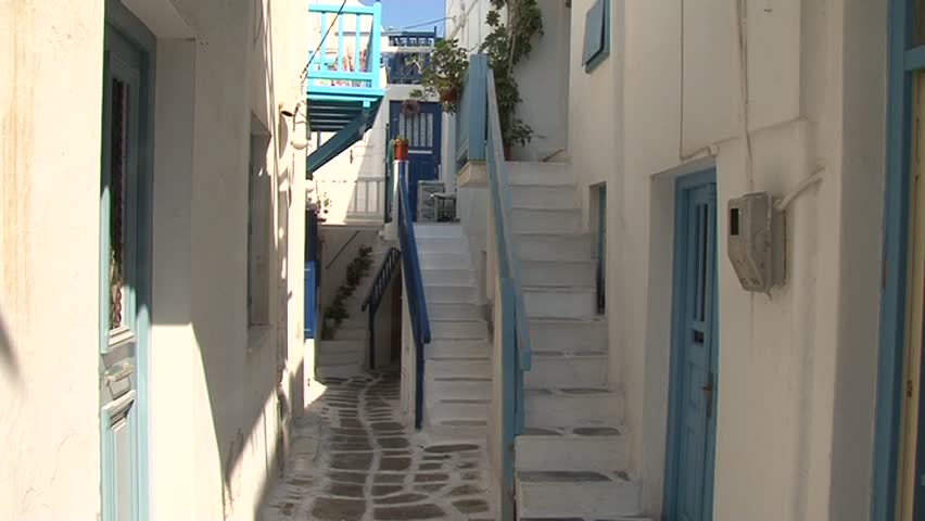 A typical narrow alley in the town of Mykonos, Greece