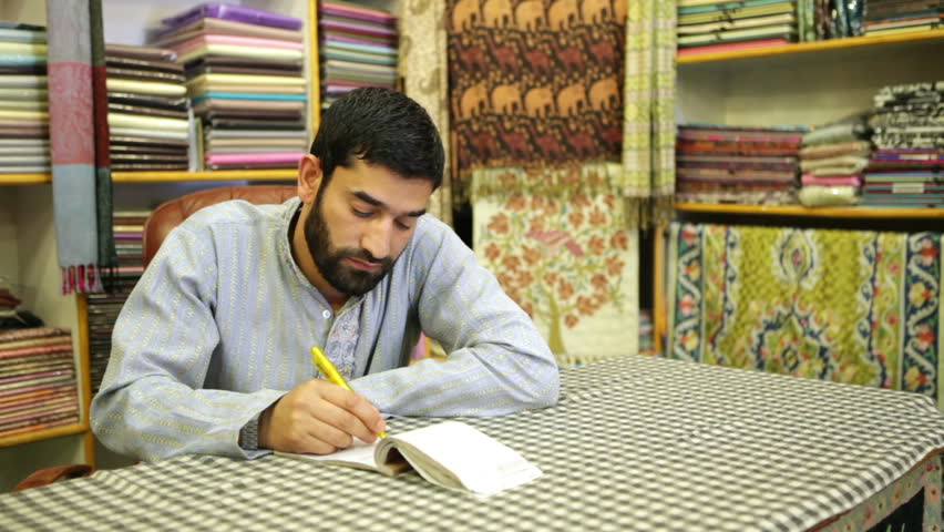 Asian male beauty. Seller of Pashmina originally from Kashmir.