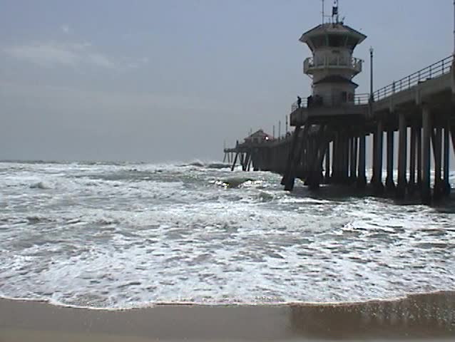 The South Side of the world famous Huntington Beach pier during heavy winds and rough seas With Sound