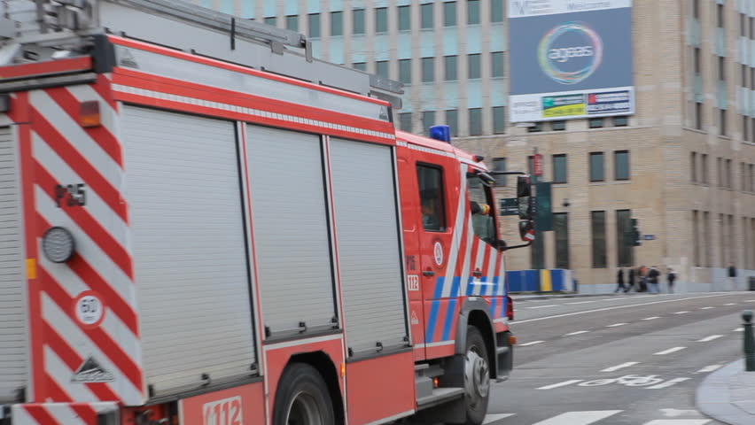 BRUSSELS, BELGIUM - DECEMBER 20: Firefighters on Street in Brussels, Belgium on December 20, 2011.