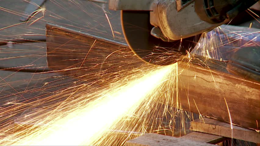 Trimming of the metal channel bars with an Angle Grinder.
