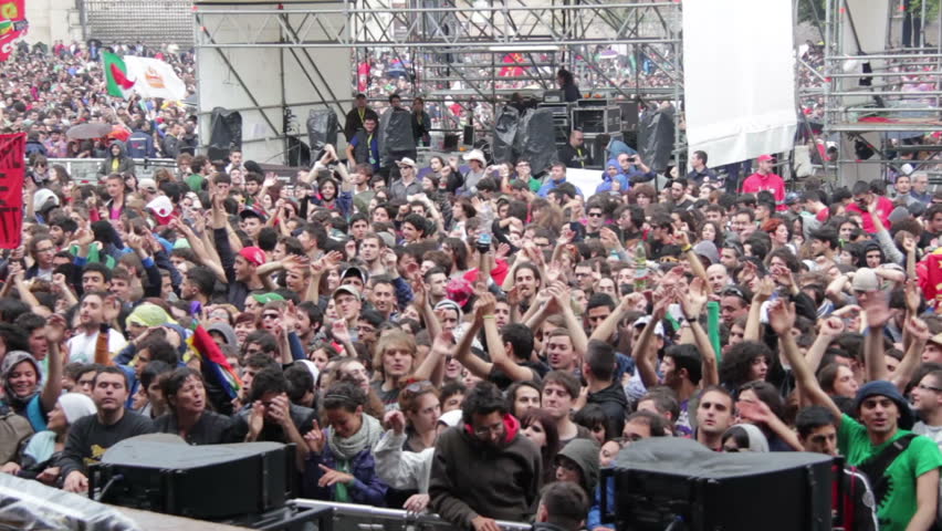 ROME, ITALY - MAY 1: People attend free "Concerto del Primo Maggio" ("Workers' Day Concert") in Piazza San Giovanni (San Giovanni Square) on Workers' Day, May 1, 2012 in Rome, Italy.