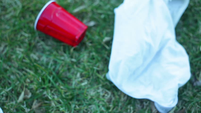 A yard, after a college party.