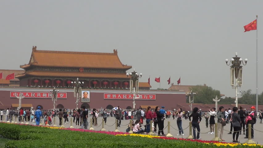 BEIJING, CHINA - APRIL 25, 2012, Fast motion of Forbidden city and people in Tiananmen Square
