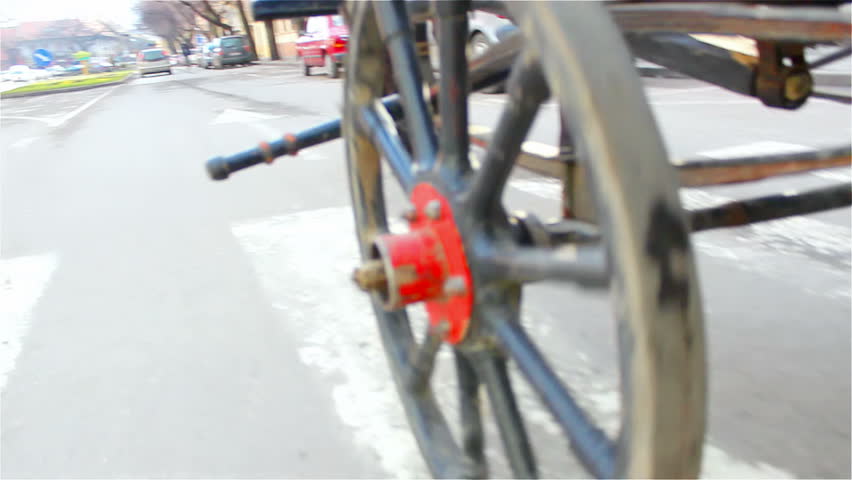 Wheel from the old carriage pulled by a horse, Carriages, video clip. pov