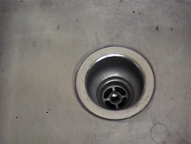 Water running down the drain
