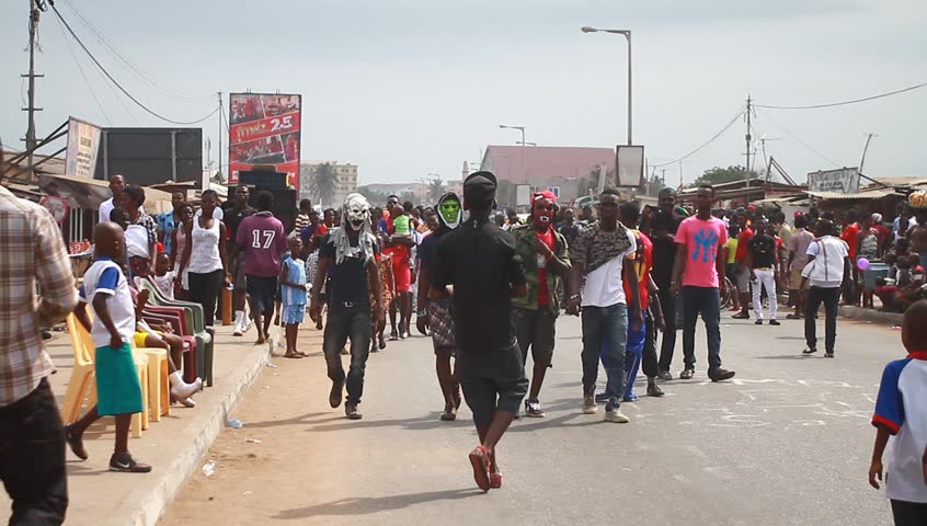 ACCRA, GHANA - CIRCA DEC 2012: People in the street during the Homowo Festival in Accra, Ghana circa December 2012. Celebrated by the Ga people in remembrance of a historical famine.